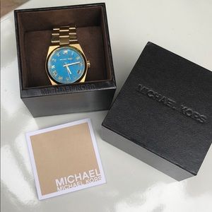 Micheal Kors blue and gold watch